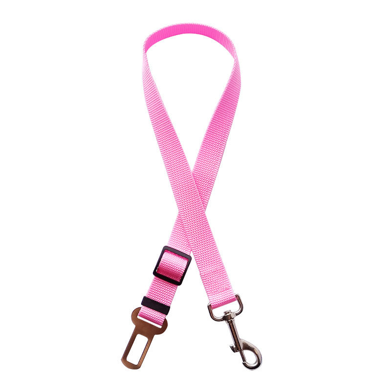 Adjustable PetVibe™ Universal Safety Seat Belt for pets, shown attached to car seat and harness for secure travel.