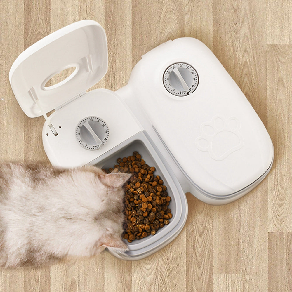 PetVibe™ Smart Automatic Pet Feeder with hygienic stainless steel bowl, showing the sleek design and digital control panel.